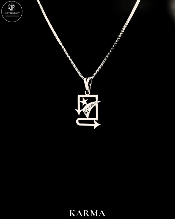 A centered product image of the Karma pendant with a box chain, set on a solid black background with the Just Pendant logo at the top-left and "KARMA" written at the bottom.